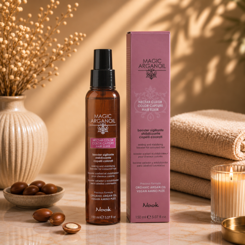 Nook Nectar Color Elixir 150 ml – eliksir uszczelniający do włosów farbowanych i rozjaśnianych. Wspiera ochronę koloru, wygładza pasma i podkreśla ich blask. Idealny do pielęgnacji włosów po koloryzacji. Dostępny w ART FRYZ.